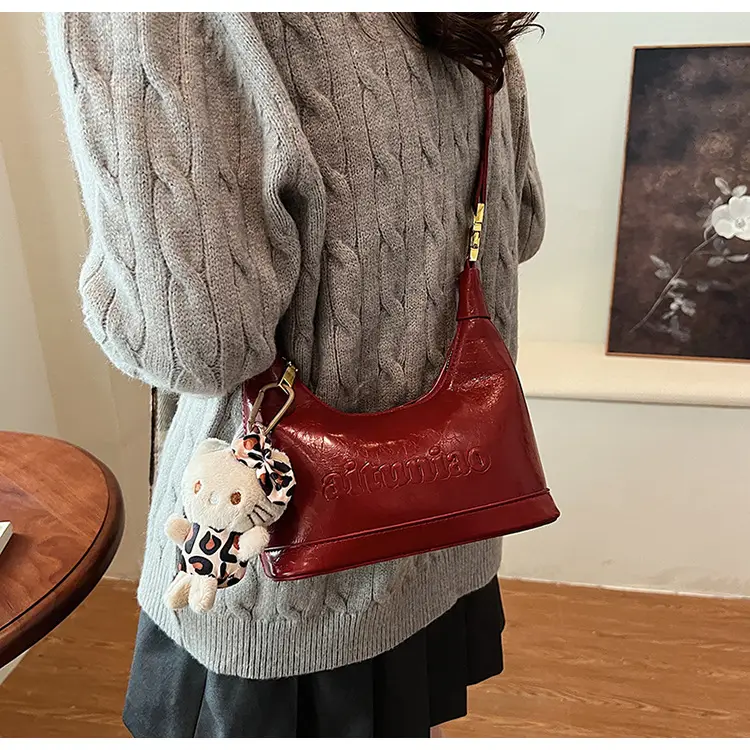 Black Leather Crossbody Bag with Cute Charm — feature 23