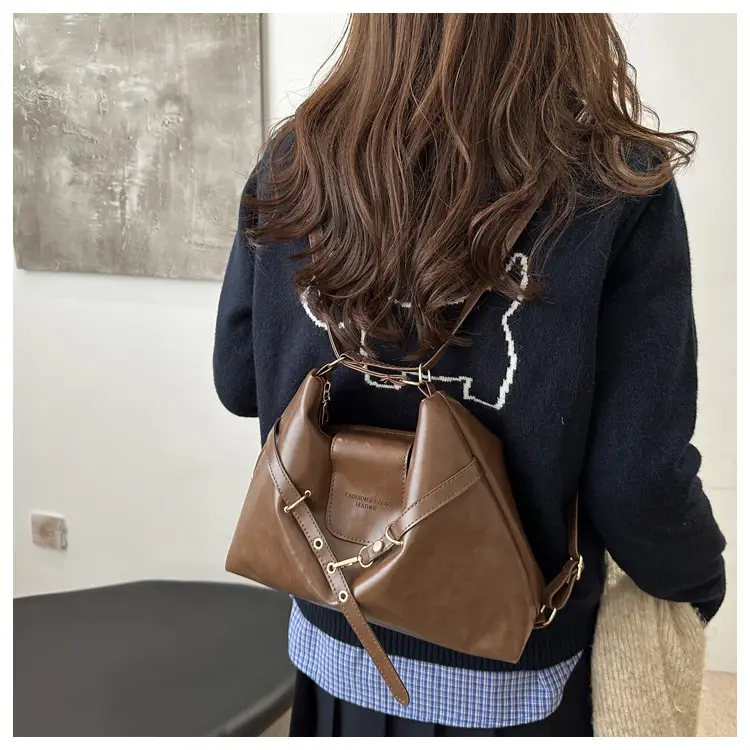 Vintage Women's Black Leather Tote Bag with Belt Decor — feature 10