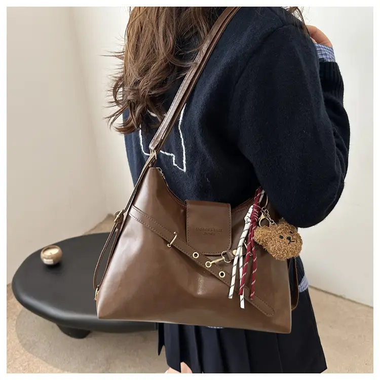 Vintage Women's Black Leather Tote Bag with Belt Decor — feature 9