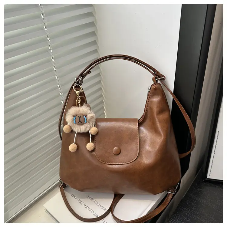 Retro Black Crossbody Bag with Doll Keychain 2024 — feature 10