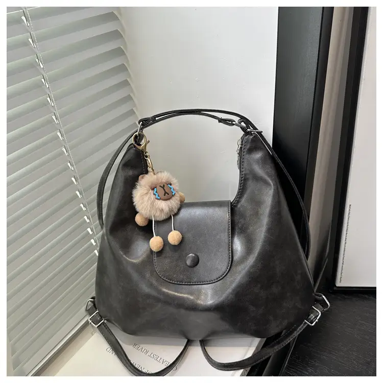 Retro Black Crossbody Bag with Doll Keychain 2024 — feature 11