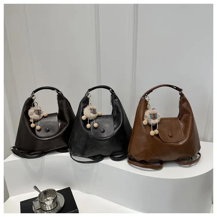 Retro Black Crossbody Bag with Doll Keychain 2024 — feature 12