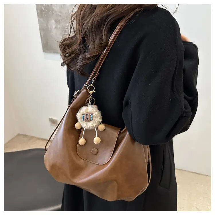 Retro Black Crossbody Bag with Doll Keychain 2024 — feature 13