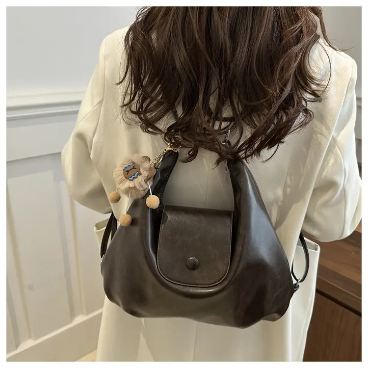 Retro Black Crossbody Bag with Doll Keychain 2024 — feature 18