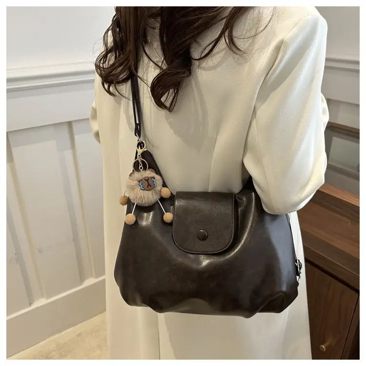 Retro Black Crossbody Bag with Doll Keychain 2024 — feature 20