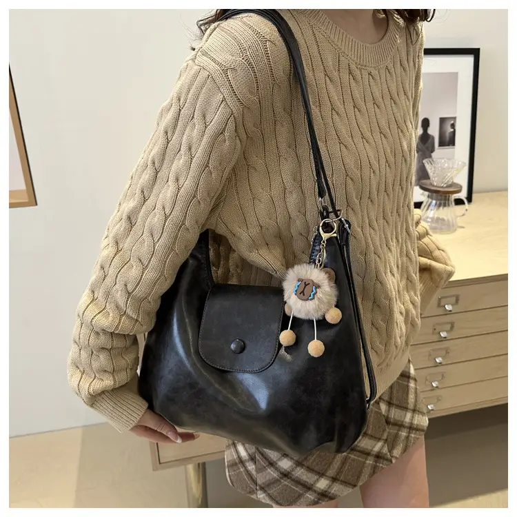 Retro Black Crossbody Bag with Doll Keychain 2024 — feature 21