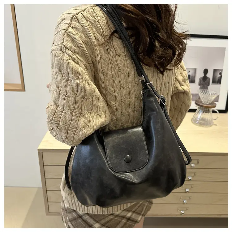 Retro Black Crossbody Bag with Doll Keychain 2024 — feature 23