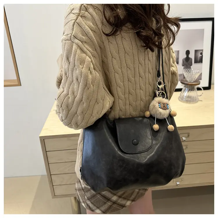 Retro Black Crossbody Bag with Doll Keychain 2024 — feature 24