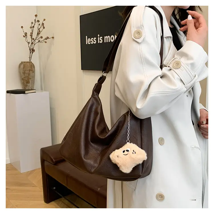 Large Capacity Brown Leather Shoulder Bag with Cute Charm — feature 11