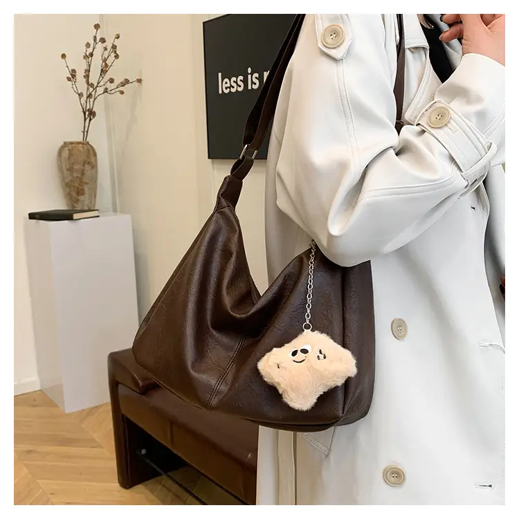 Large Capacity Brown Leather Shoulder Bag with Cute Charm — feature 12