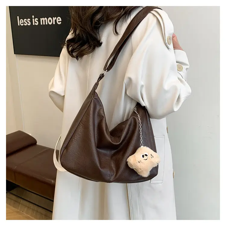 Large Capacity Brown Leather Shoulder Bag with Cute Charm — feature 13