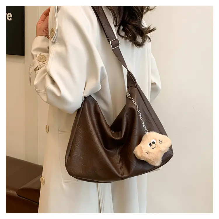 Large Capacity Brown Leather Shoulder Bag with Cute Charm — feature 14
