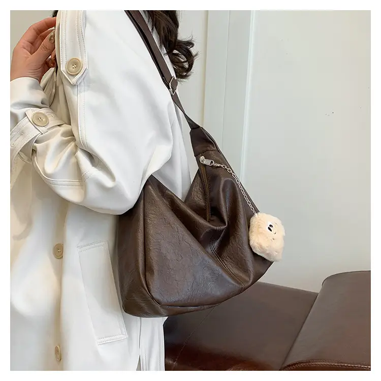 Large Capacity Brown Leather Shoulder Bag with Cute Charm — feature 16
