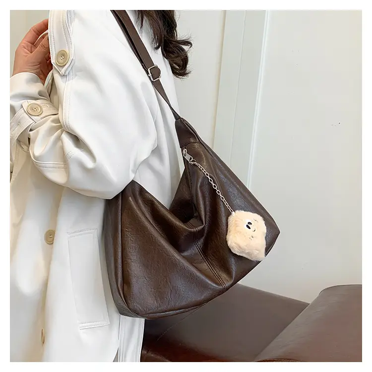 Large Capacity Brown Leather Shoulder Bag with Cute Charm — feature 17