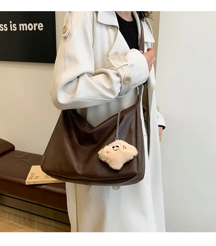 Large Capacity Brown Leather Shoulder Bag with Cute Charm — feature 2