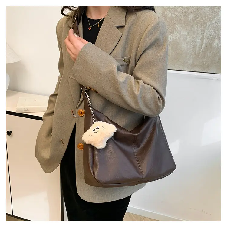 Large Capacity Brown Leather Shoulder Bag with Cute Charm — feature 20