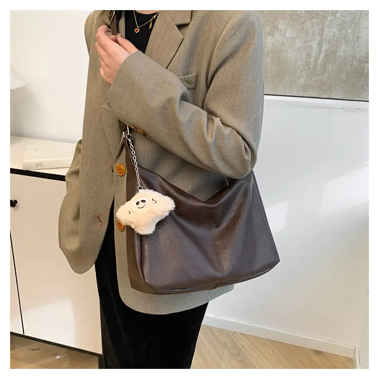 Large Capacity Brown Leather Shoulder Bag with Cute Charm — feature 21