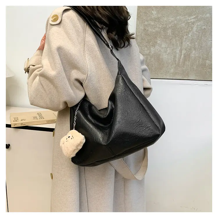 Large Capacity Brown Leather Shoulder Bag with Cute Charm — feature 22