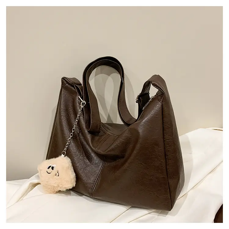 Large Capacity Brown Leather Shoulder Bag with Cute Charm — feature 27