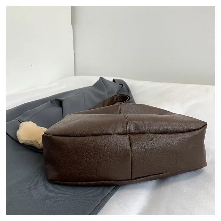 Large Capacity Brown Leather Shoulder Bag with Cute Charm — feature 31