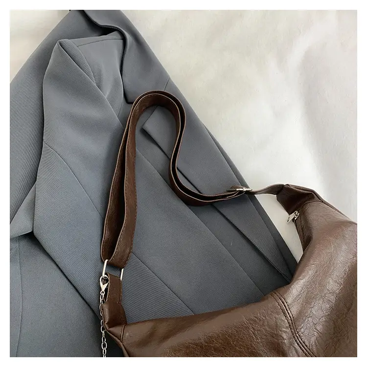 Large Capacity Brown Leather Shoulder Bag with Cute Charm — feature 32