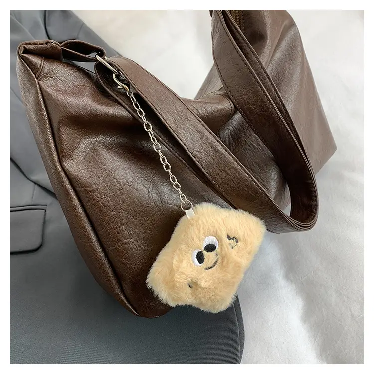 Large Capacity Brown Leather Shoulder Bag with Cute Charm — feature 33