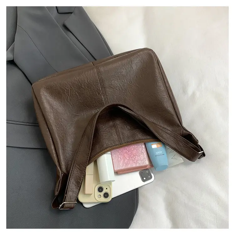 Large Capacity Brown Leather Shoulder Bag with Cute Charm — feature 38