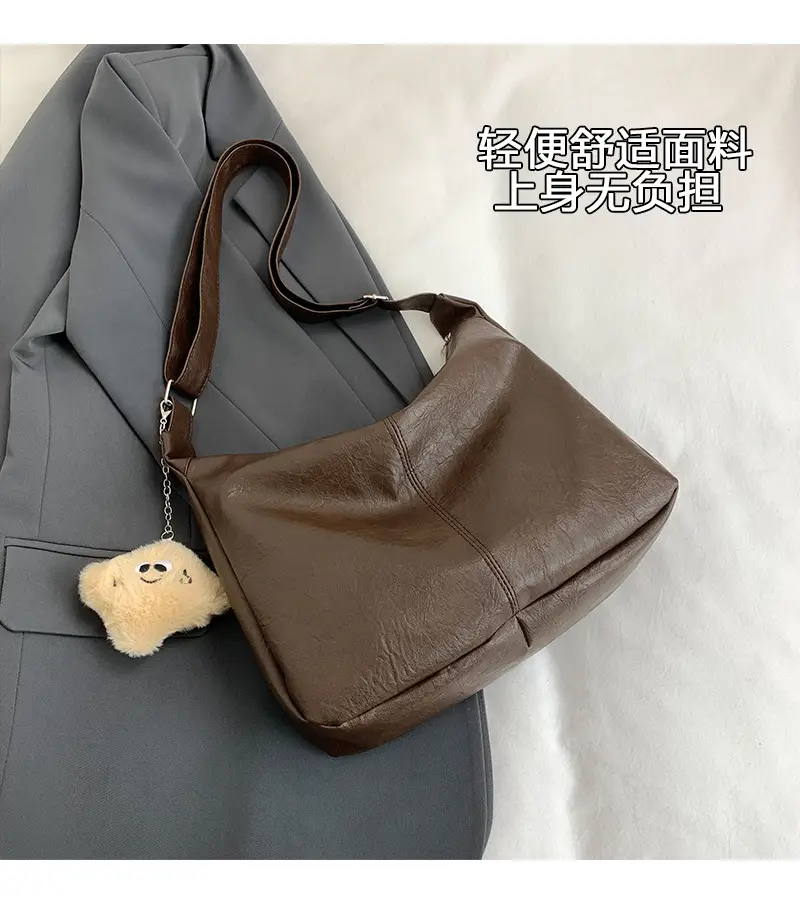 Large Capacity Brown Leather Shoulder Bag with Cute Charm — feature 5