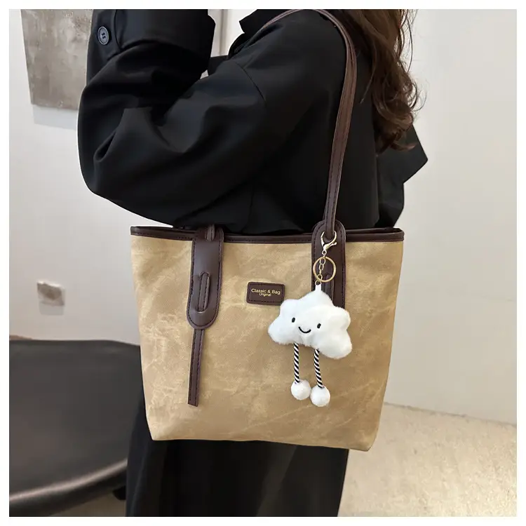 Vintage Women's Textured Shoulder Bag with Cute Keychain - Image 9