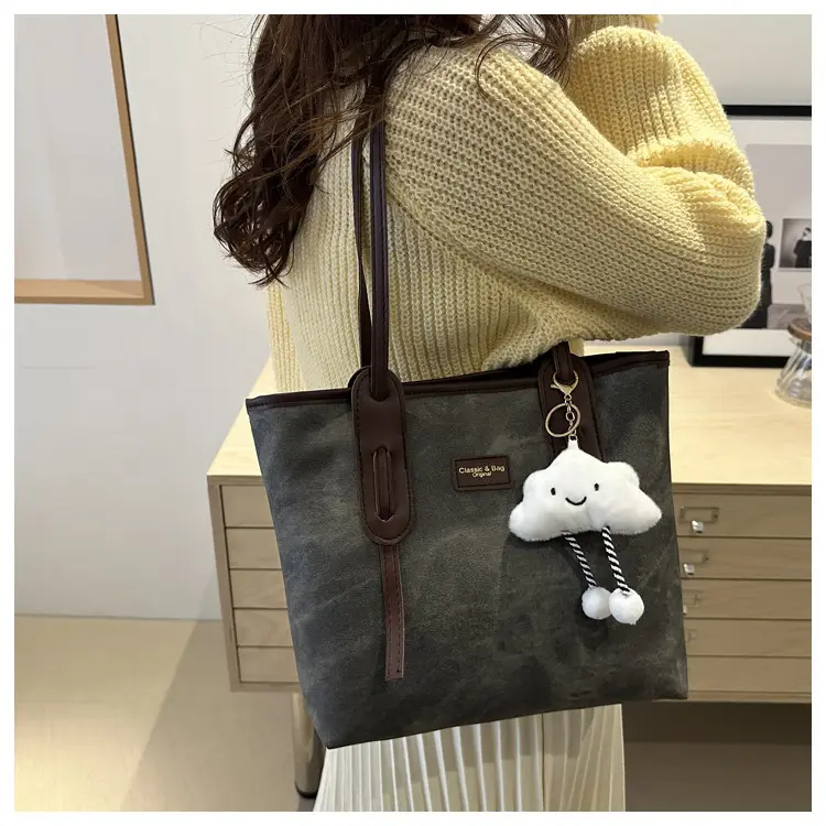 Vintage Women's Textured Shoulder Bag with Cute Keychain - Image 10