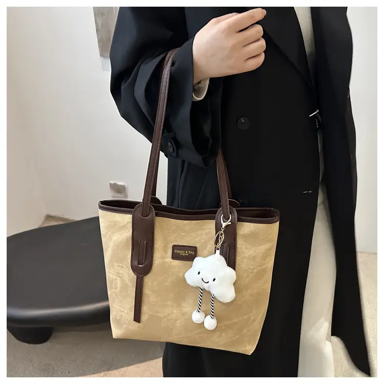 Vintage Women's Textured Shoulder Bag with Cute Keychain — feature 10