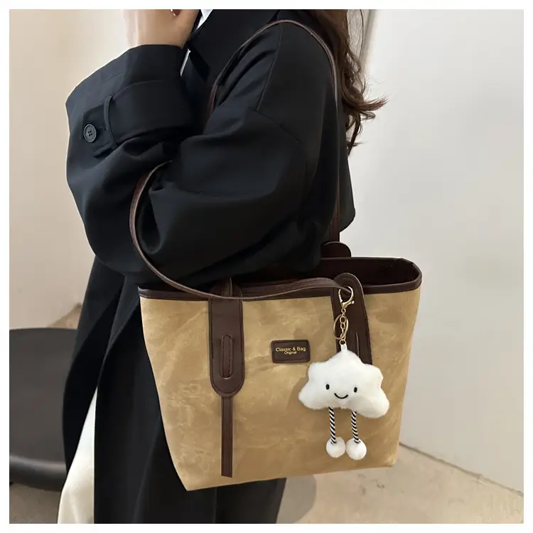 Vintage Women's Textured Shoulder Bag with Cute Keychain — feature 12