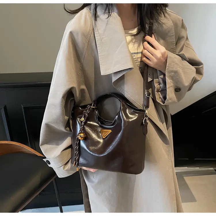 Retro Brown Bucket Bag with Gold Plated Logo — feature 10