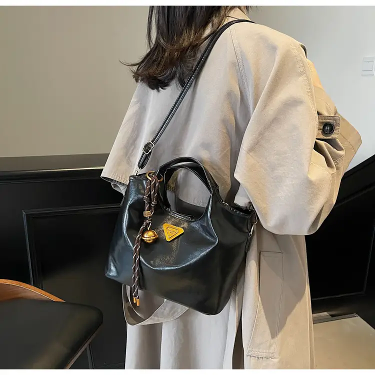 Retro Brown Bucket Bag with Gold Plated Logo — feature 11