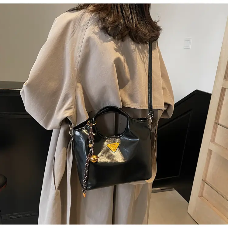 Retro Brown Bucket Bag with Gold Plated Logo — feature 12