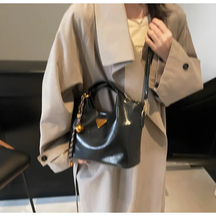 Retro Brown Bucket Bag with Gold Plated Logo — feature 13