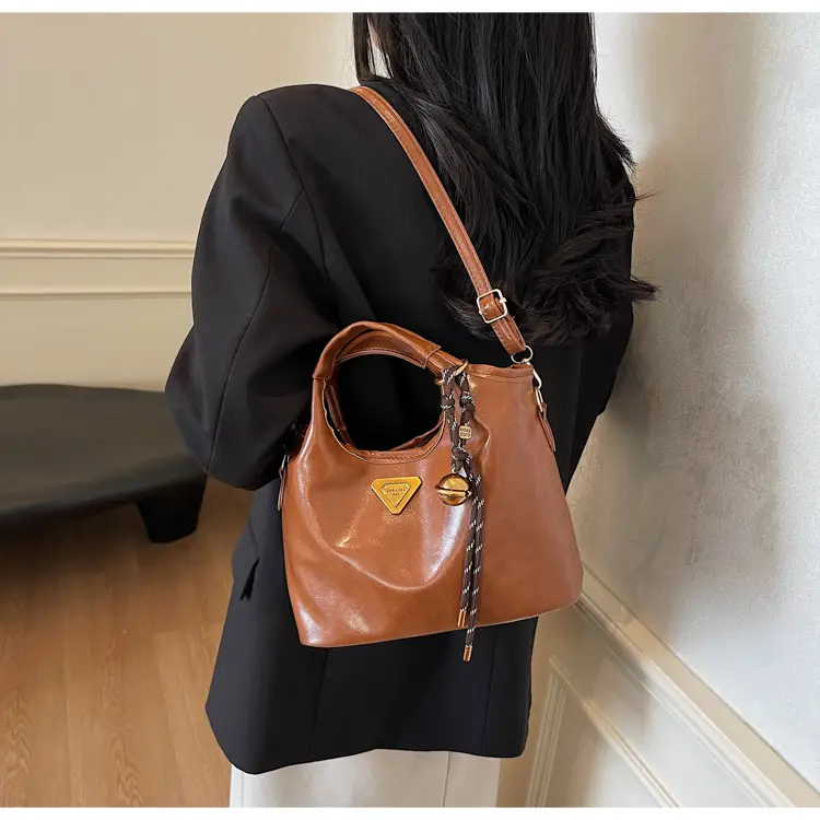 Retro Brown Bucket Bag with Gold Plated Logo — feature 14