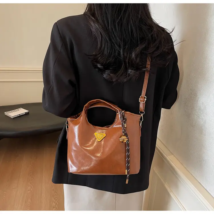 Retro Brown Bucket Bag with Gold Plated Logo — feature 15
