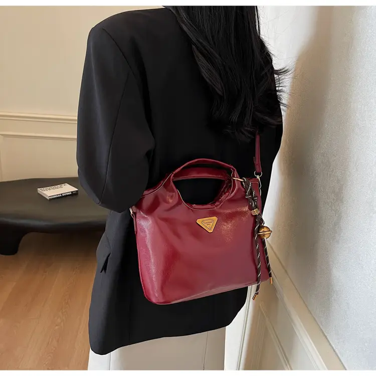 Retro Brown Bucket Bag with Gold Plated Logo — feature 17