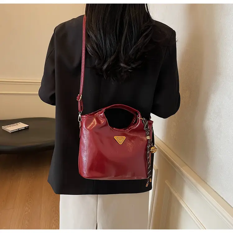 Retro Brown Bucket Bag with Gold Plated Logo — feature 18