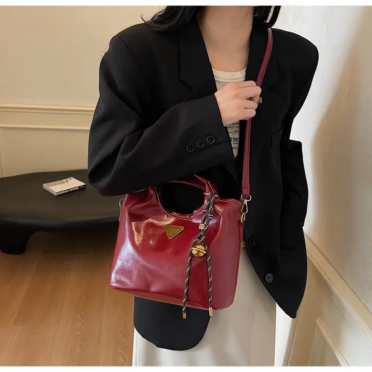 Retro Brown Bucket Bag with Gold Plated Logo — feature 19