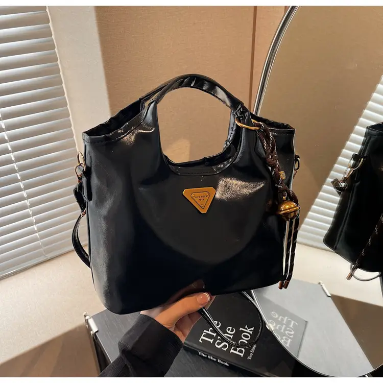 Retro Brown Bucket Bag with Gold Plated Logo — feature 21