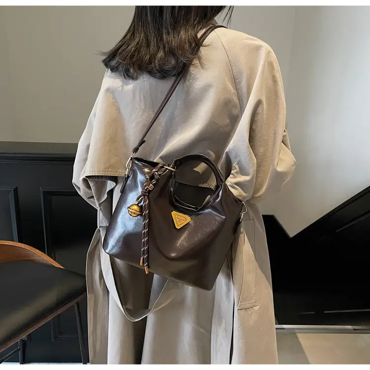 Retro Brown Bucket Bag with Gold Plated Logo — feature 8