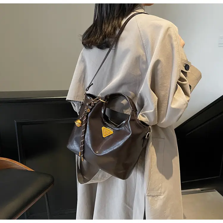 Retro Brown Bucket Bag with Gold Plated Logo — feature 9