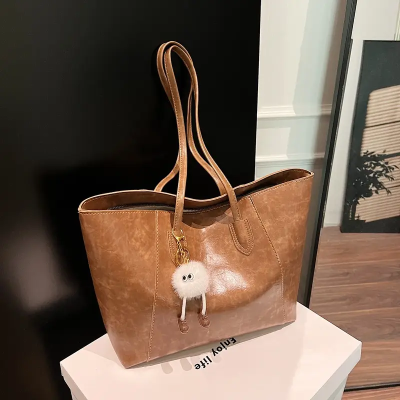Retro Brown Leather Shoulder Bag with Pom Pom Charm - Image 9