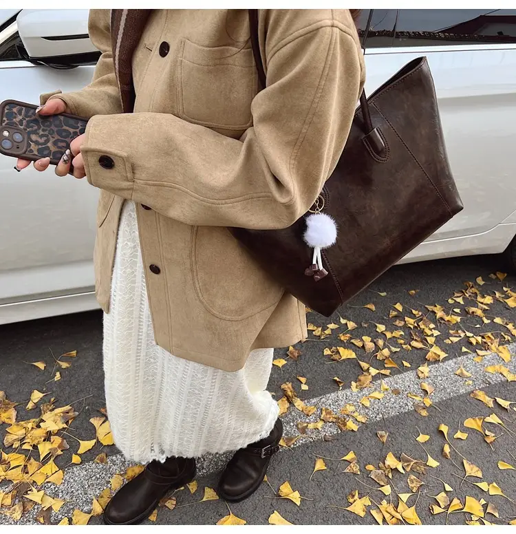 Retro Brown Leather Shoulder Bag with Pom Pom Charm — feature 16