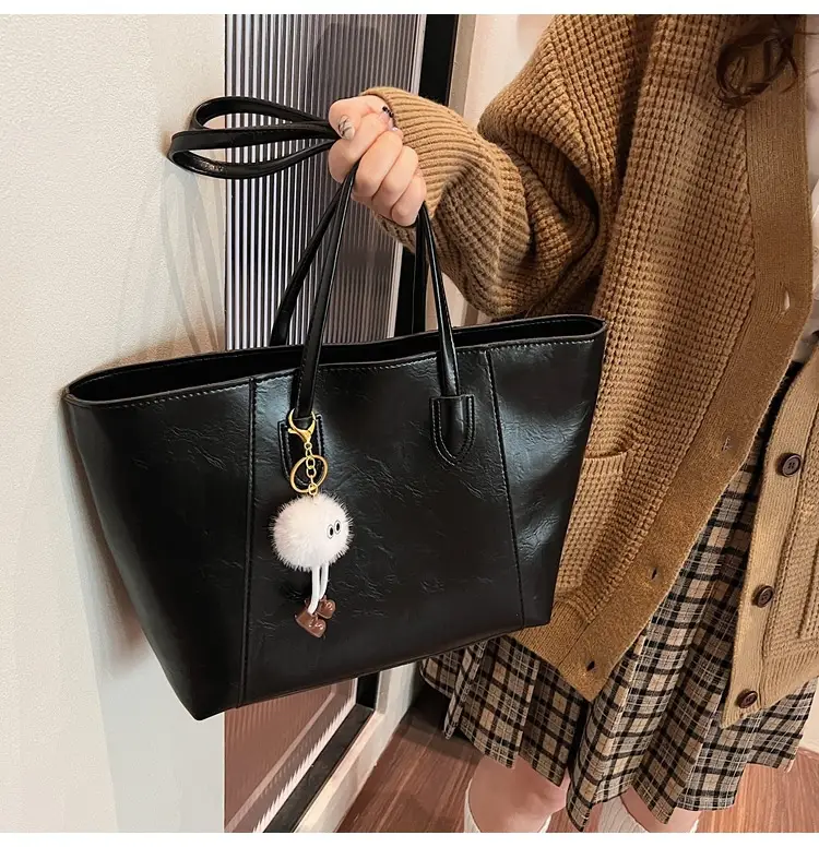 Retro Brown Leather Shoulder Bag with Pom Pom Charm — feature 26