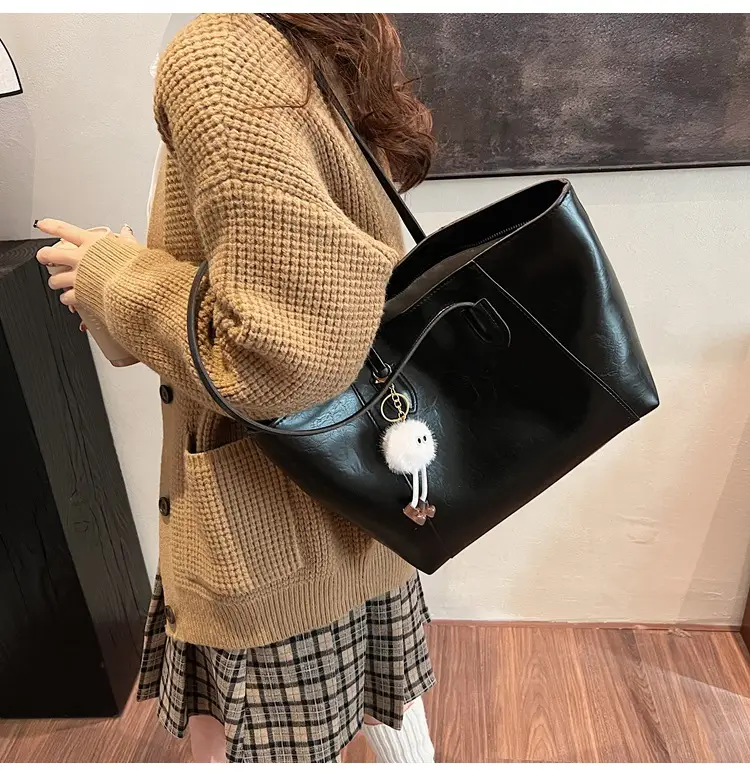 Retro Brown Leather Shoulder Bag with Pom Pom Charm — feature 28