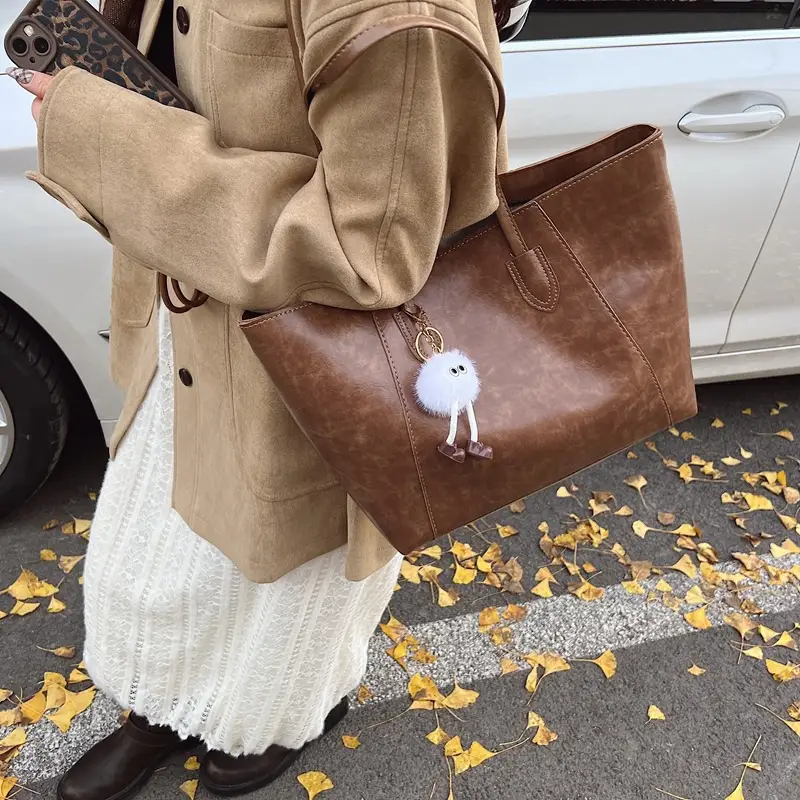 Retro Brown Leather Shoulder Bag with Pom Pom Charm - Image 7