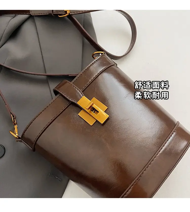 Black Leather Shoulder Bag with Gold Hardware — feature 2